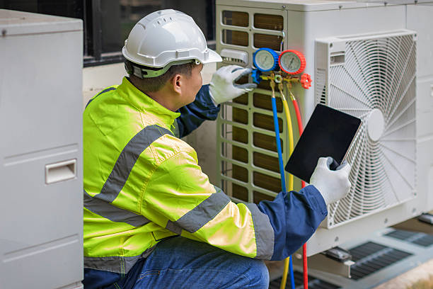 Professional Ductwork Repair technician working in Ashippun, WI